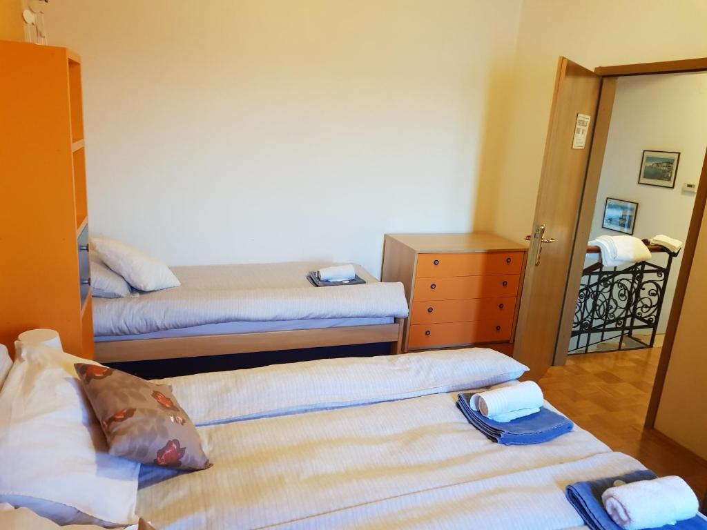 Postel nebo postele na pokoji v ubytování Villa Maria