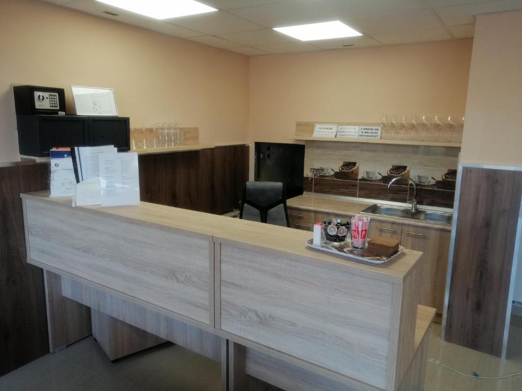 Kuchyň nebo kuchyňský kout v ubytování M7 Galéria Panzió