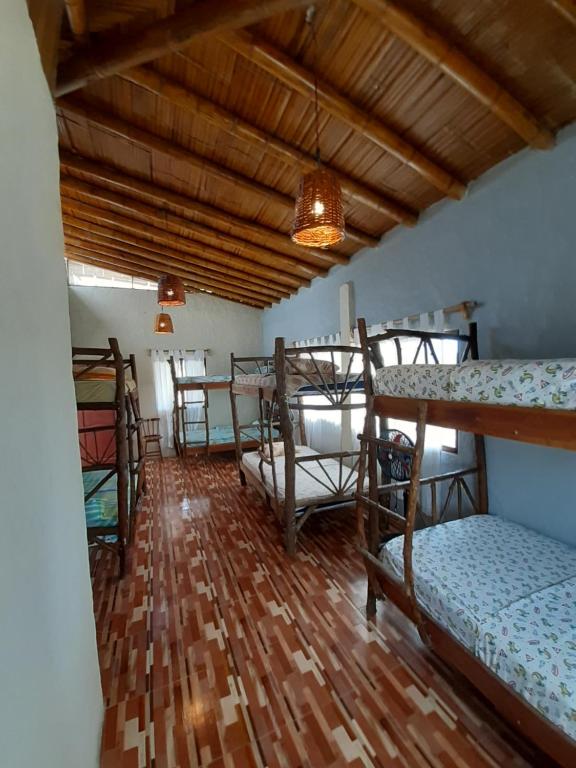 Postel nebo postele na pokoji v ubytování The Weekend Hostal