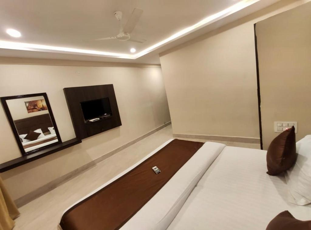 Postel nebo postele na pokoji v ubytování New Hotel Suhail