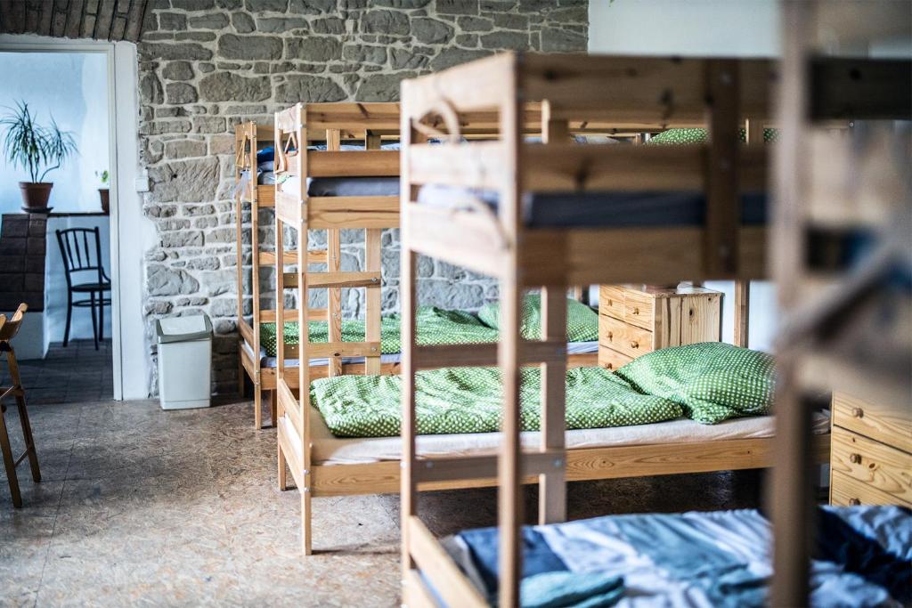 Postel nebo postele na pokoji v ubytování Statek Luníkov