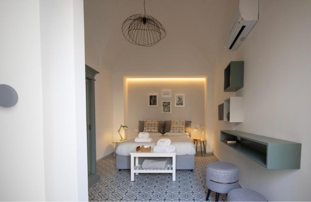Postel nebo postele na pokoji v ubytování Carlo Alberto Room