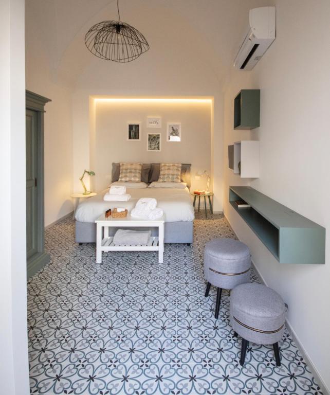 Postel nebo postele na pokoji v ubytování Carlo Alberto Room