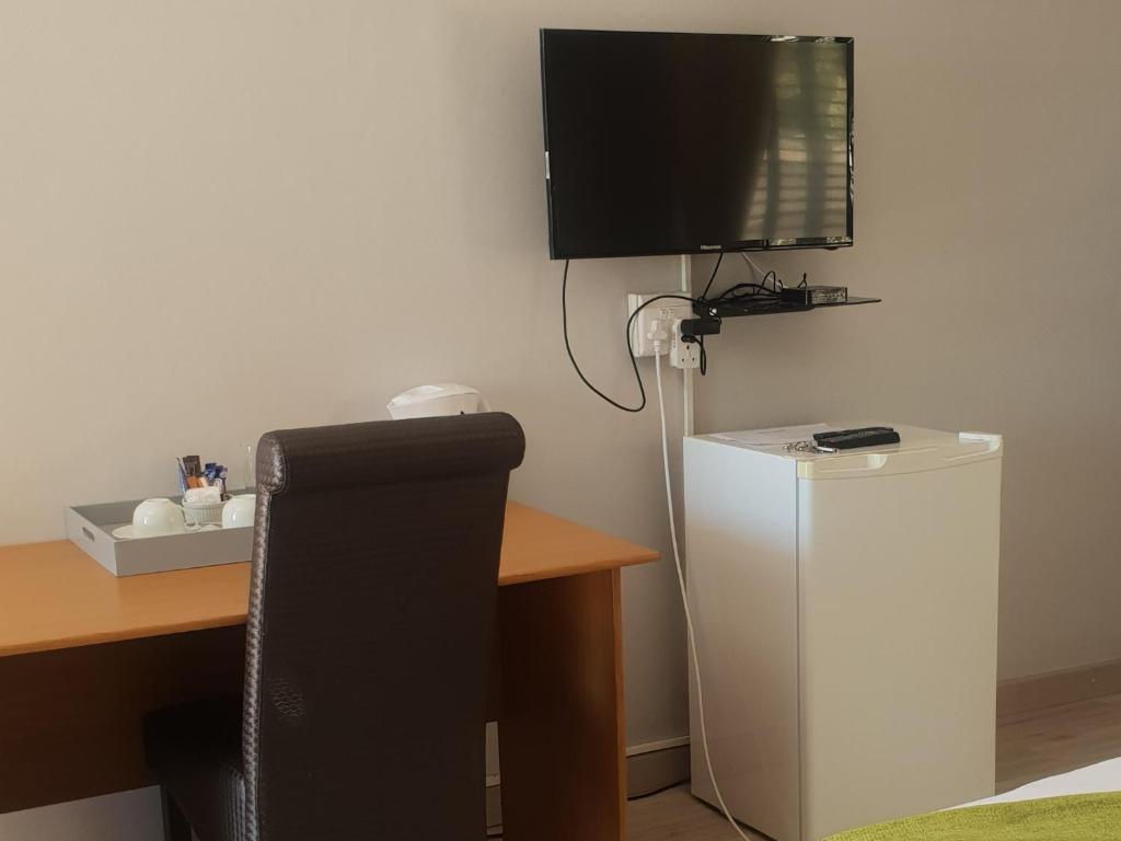 TV a/nebo společenská místnost v ubytování Vaticious