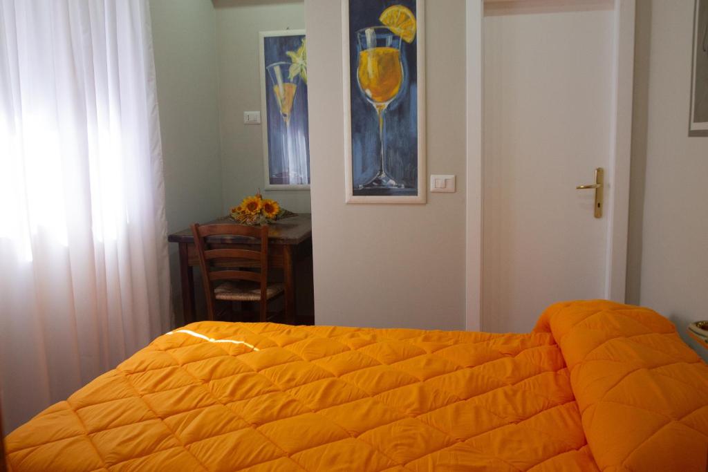 Postel nebo postele na pokoji v ubytování L'Alberata dei Sogni