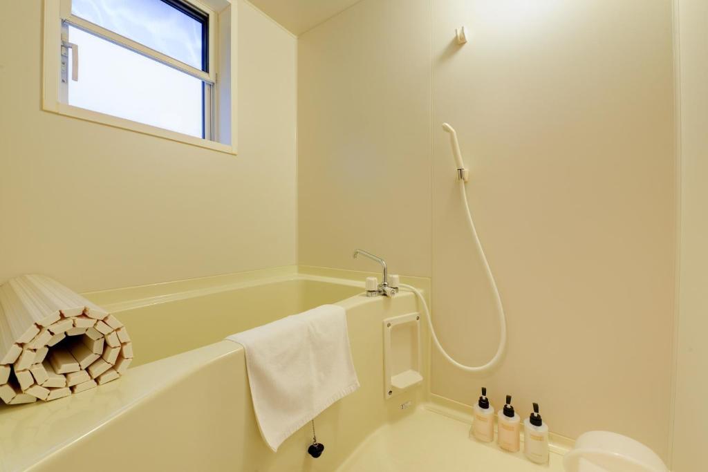 Koupelna v ubytování Aiwa no Mori Hotel