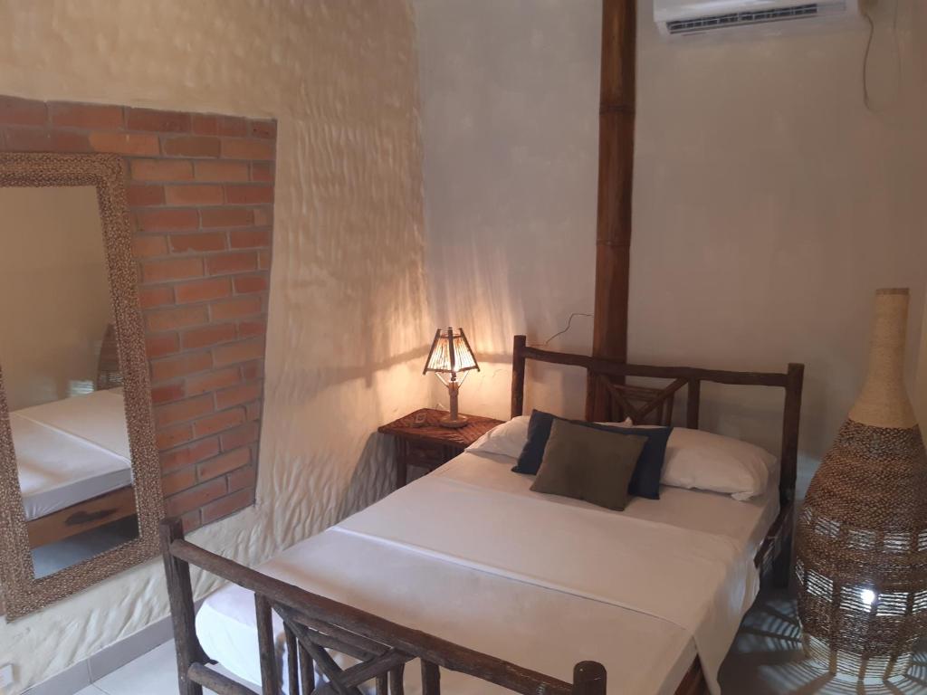 Postel nebo postele na pokoji v ubytování The Weekend Hostal