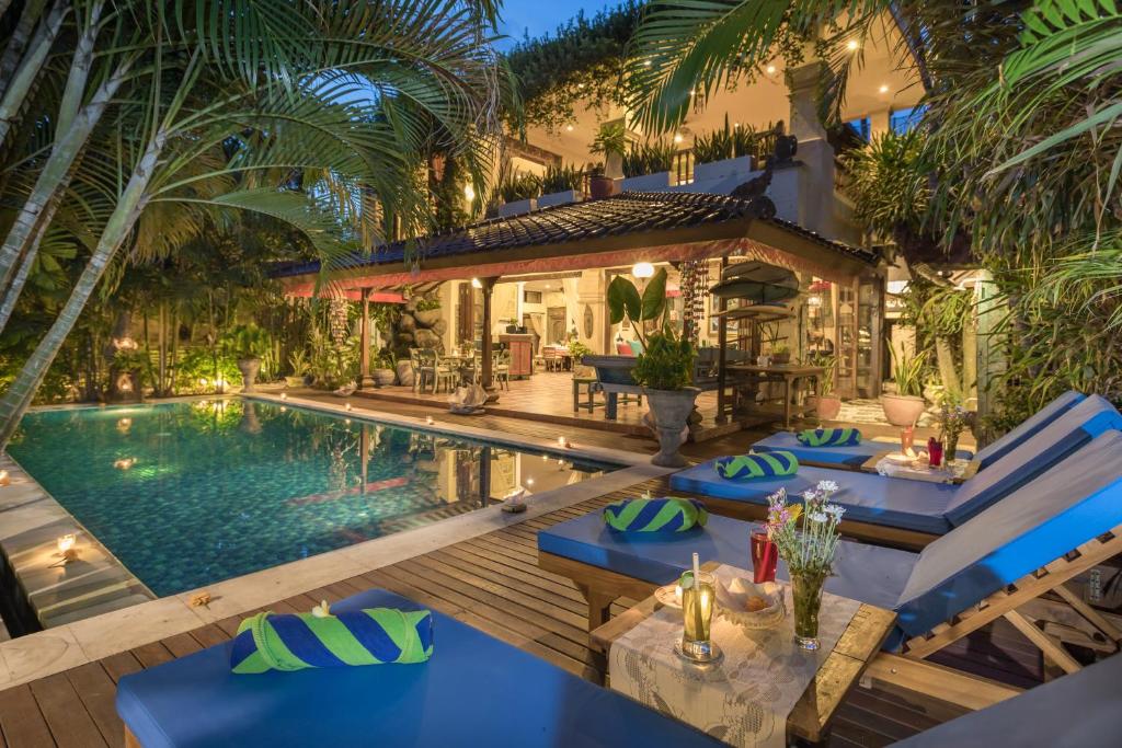 een afbeelding van een villa met zwembad bij Villa Kaja by Nagisa Bali in Seminyak