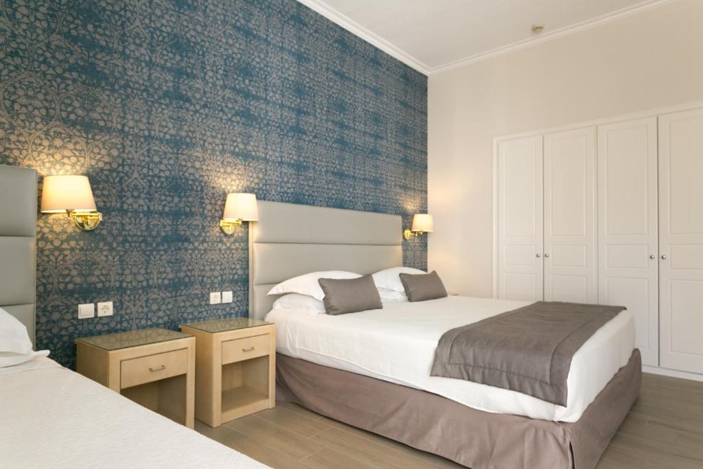 Postel nebo postele na pokoji v ubytování Thermae Sylla Spa & Wellness Hotel