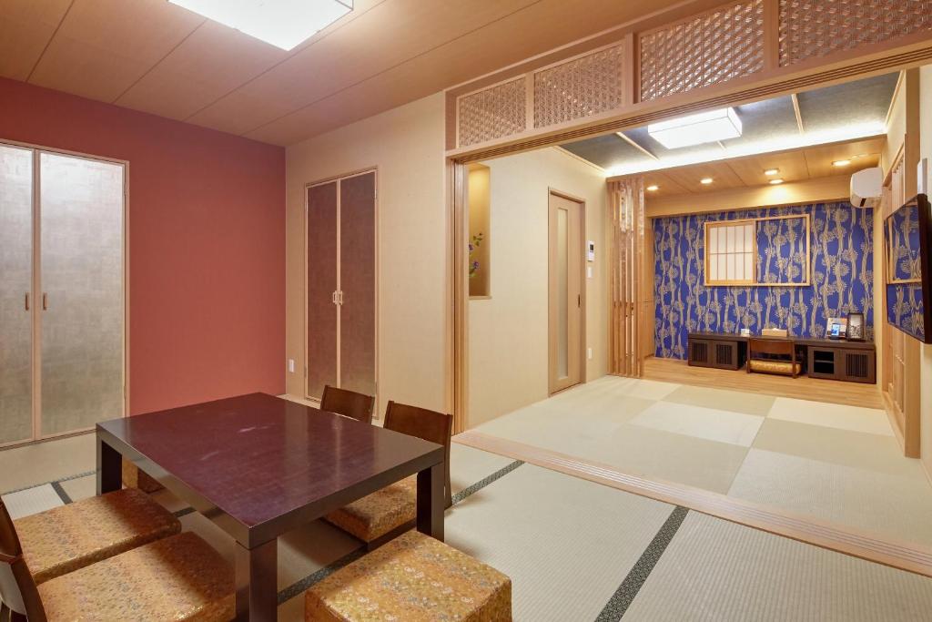 Postel nebo postele na pokoji v ubytování Hotel Amaterrace Nippombashi-higashi
