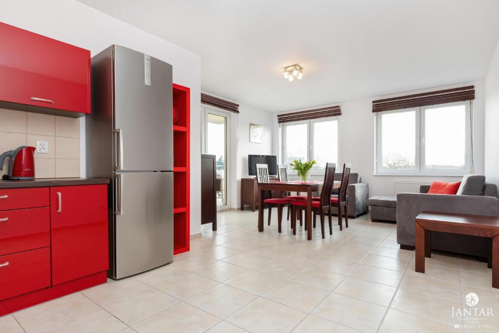 Kuchyňa alebo kuchynka v ubytovaní Jantar Apartamenty- Zielone Tarasy