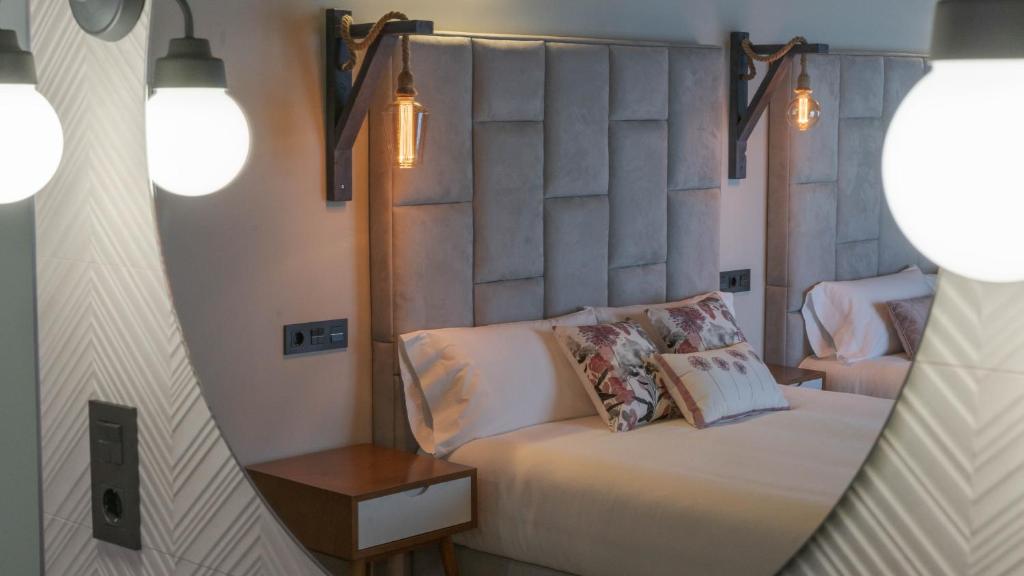 Cama o camas de una habitación en Hotel Rural Cantexos