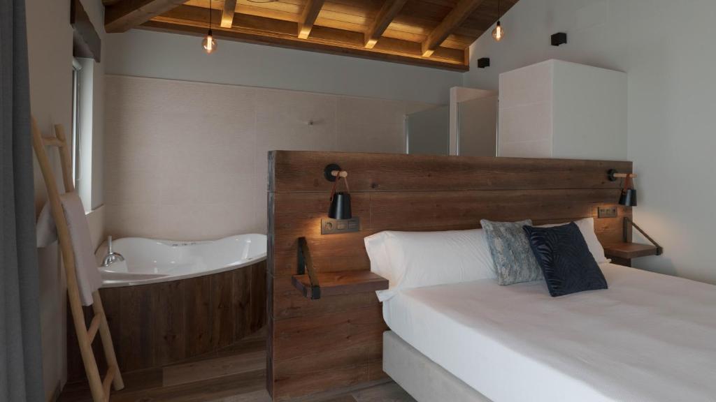 Cama o camas de una habitación en Hotel Rural Cantexos
