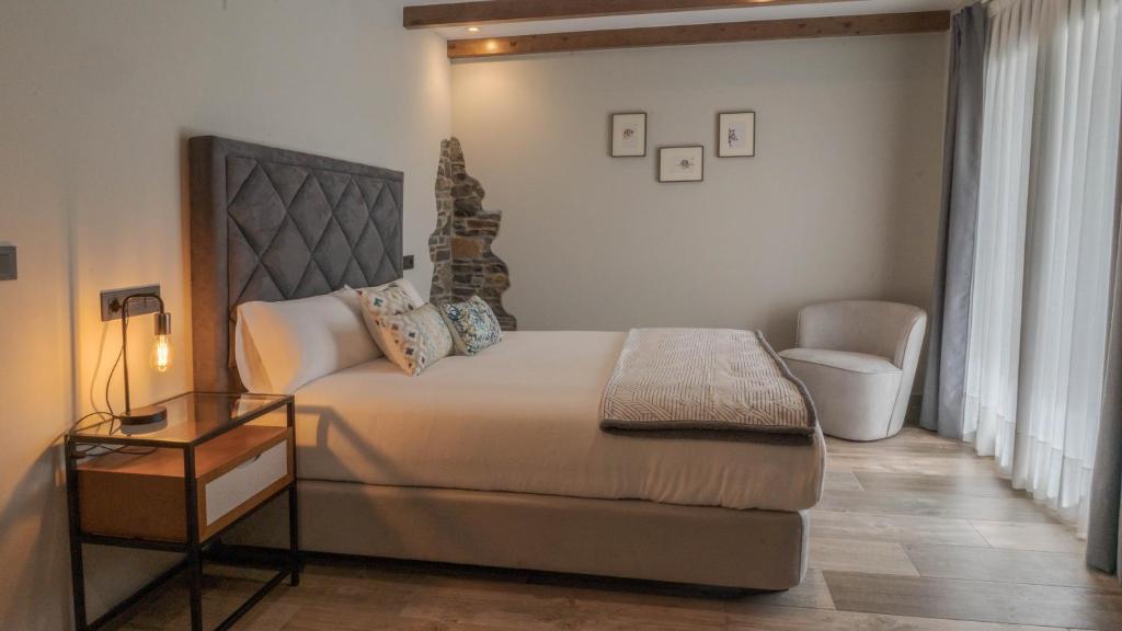 Cama o camas de una habitación en Hotel Rural Cantexos