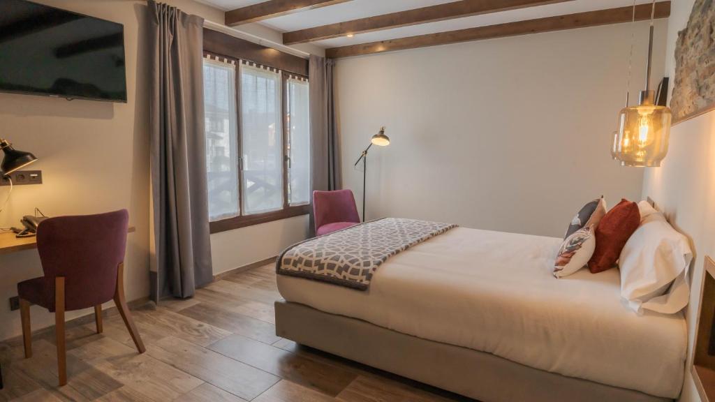 Cama o camas de una habitación en Hotel Rural Cantexos