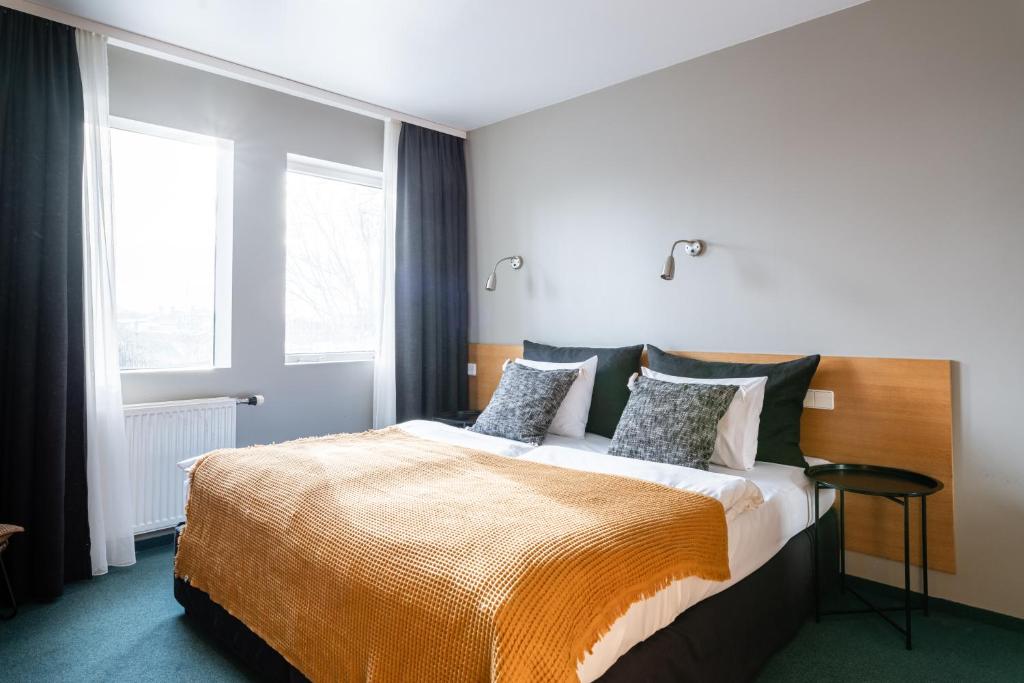 Postel nebo postele na pokoji v ubytování Hotel Leifur Eiriksson