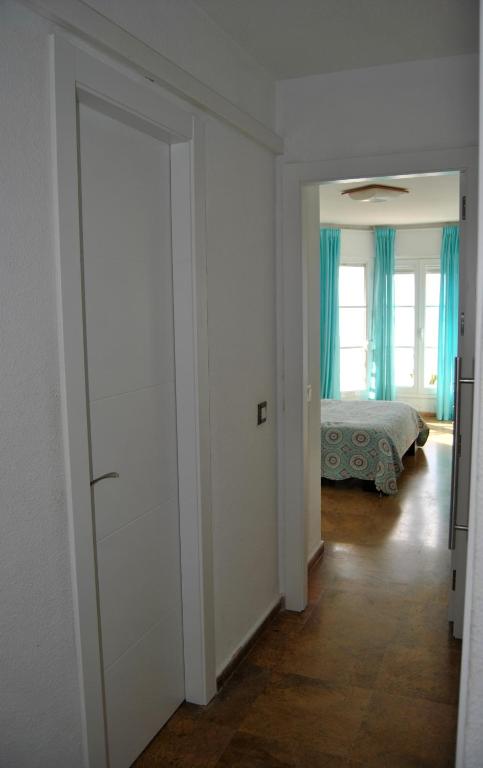 Posteľ alebo postele v izbe v ubytovaní APARTAMENTO FRENTE AL MAR,PRIMERA LINEA DE PLAYA