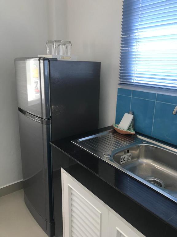 Kuchyň nebo kuchyňský kout v ubytování Origin hua hin poolvilla