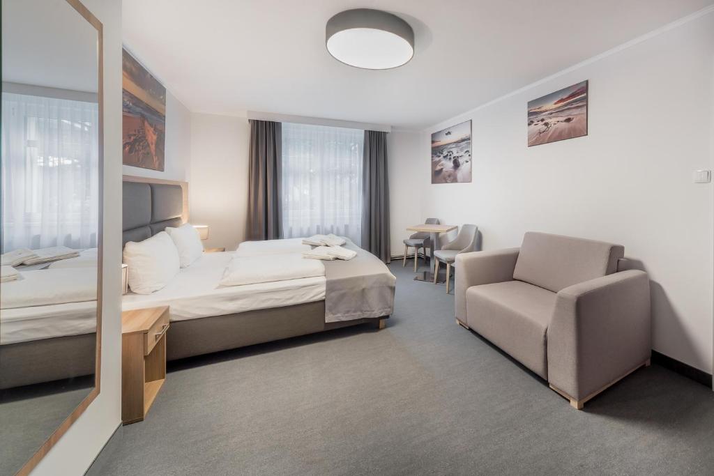 Postel nebo postele na pokoji v ubytování Harmony House