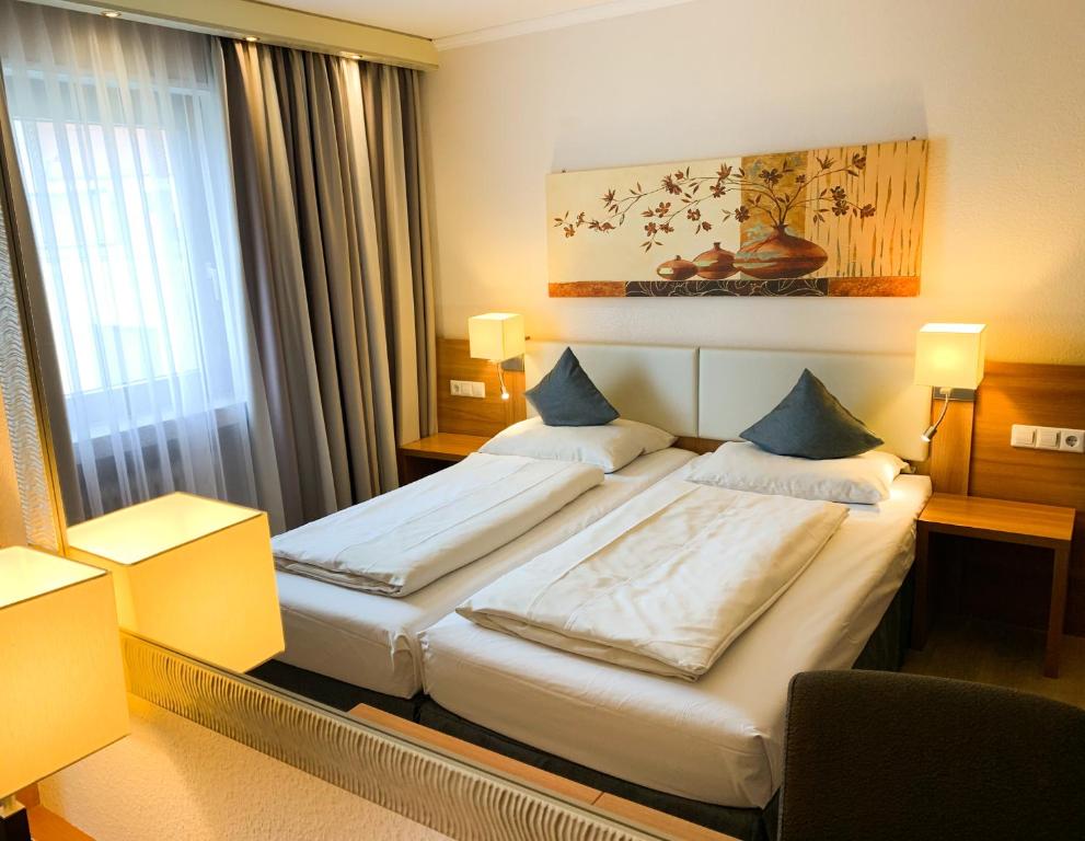 City Hotel Ost am Kö - Удобная комната