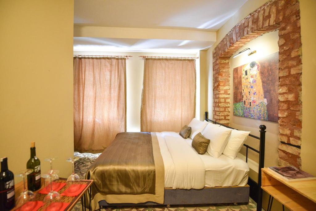 Postel nebo postele na pokoji v ubytování Maravilloso Hotel Pera