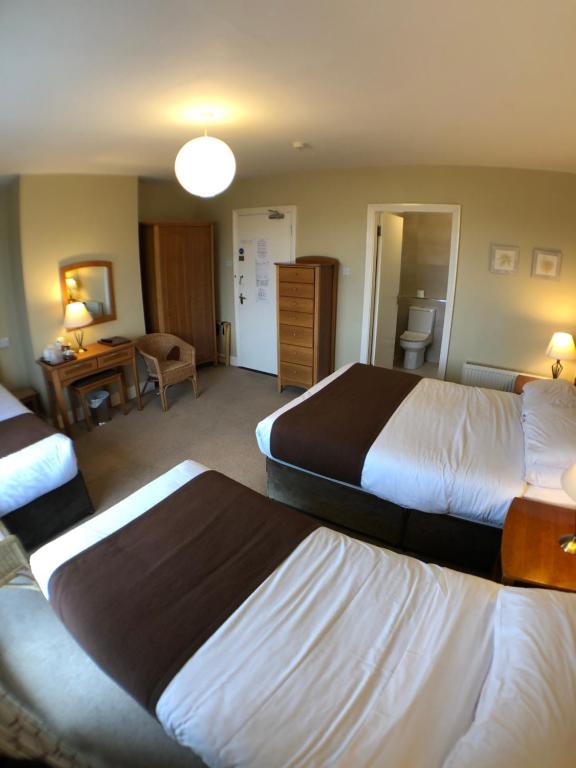 Postel nebo postele na pokoji v ubytování Beach Haven B&B