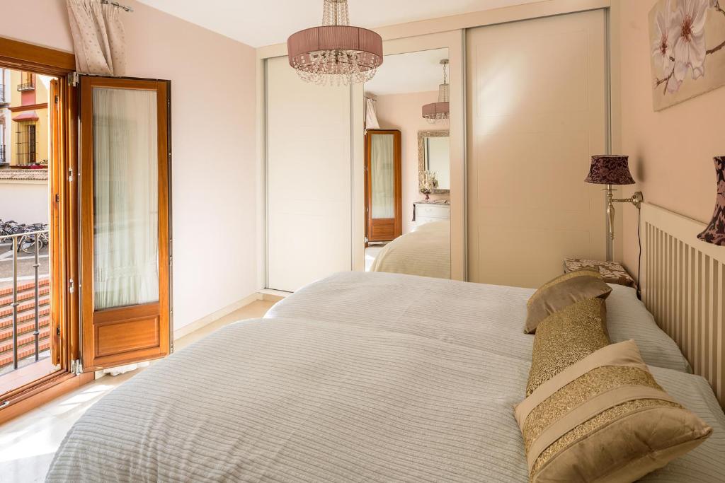 Postel nebo postele na pokoji v ubytování Veoapartment Santa Cruz