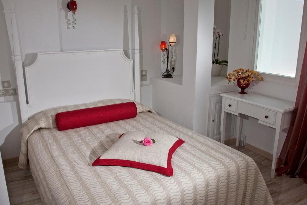 Postel nebo postele na pokoji v ubytování Delfini Villas
