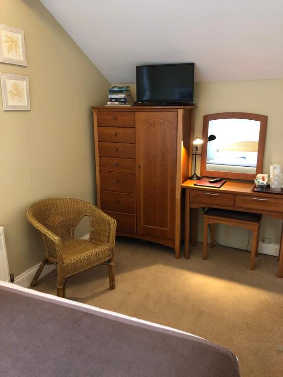TV a/nebo společenská místnost v ubytování Beach Haven B&B