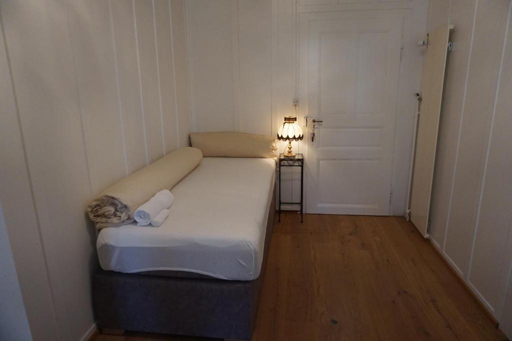 Letto o letti in una camera di Villa Pochon