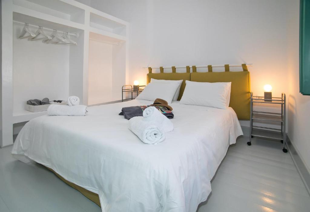 Postel nebo postele na pokoji v ubytování Scaleri Port Home