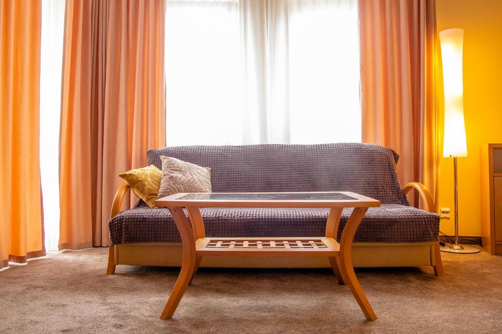Posedenie v ubytovaní AL-DOM apartamenty Olymp Sunshine