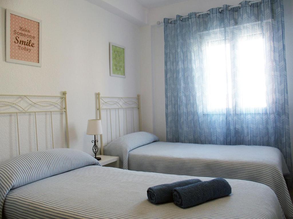 Posteľ alebo postele v izbe v ubytovaní El piso de Ursula