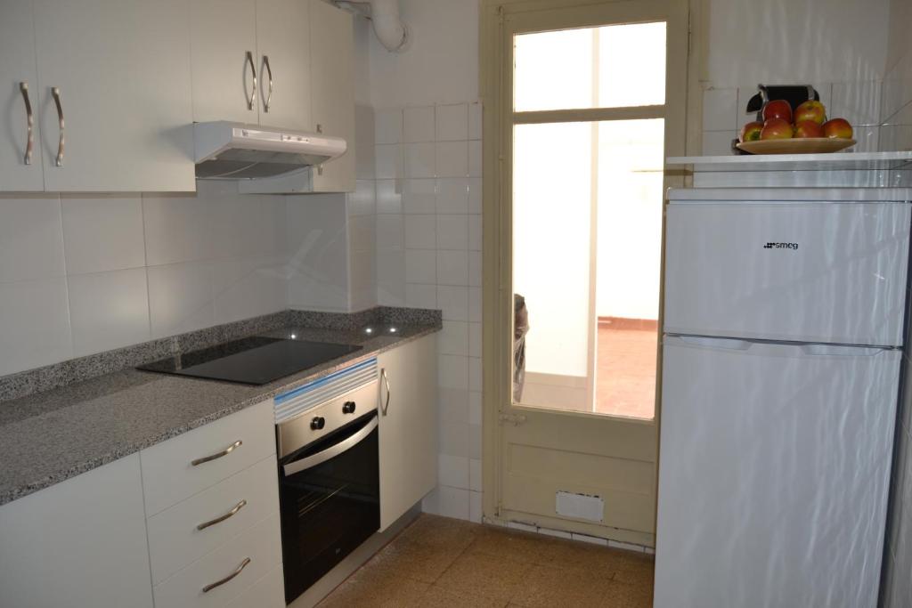 Kuchyňa alebo kuchynka v ubytovaní Sant Antoni 7 1 PISO