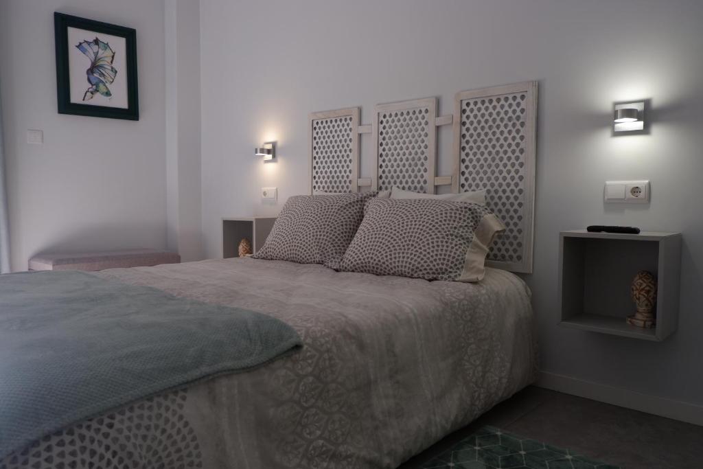 Ένα ή περισσότερα κρεβάτια σε δωμάτιο στο Apartamento Baleia