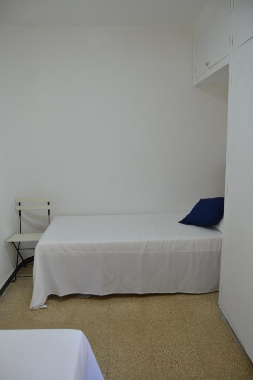 Posteľ alebo postele v izbe v ubytovaní Sant Antoni 7 1 PISO
