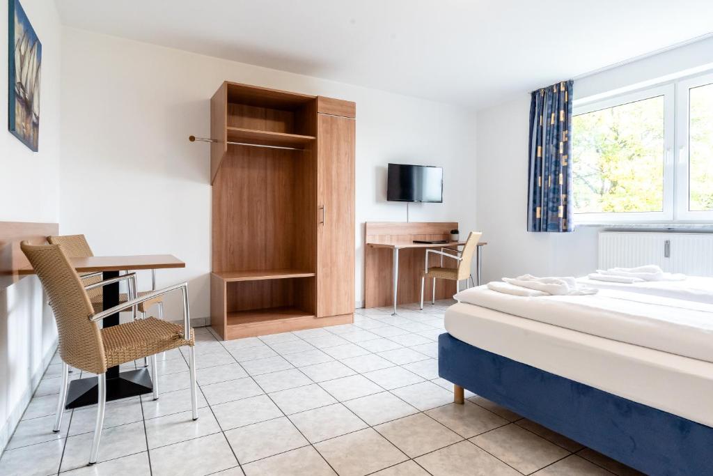 Postel nebo postele na pokoji v ubytování Hotel Fresh INN