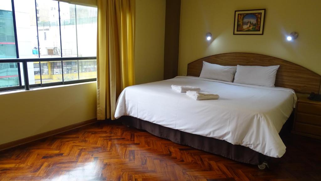 Postel nebo postele na pokoji v ubytování Suites Larco 656 Miraflores Lima
