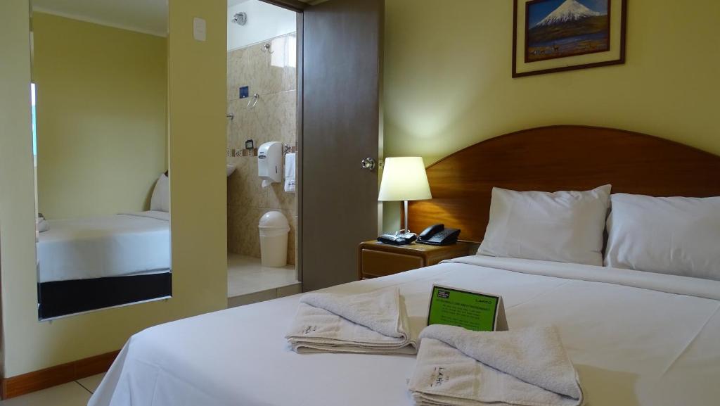Postel nebo postele na pokoji v ubytování Suites Larco 656 Miraflores Lima