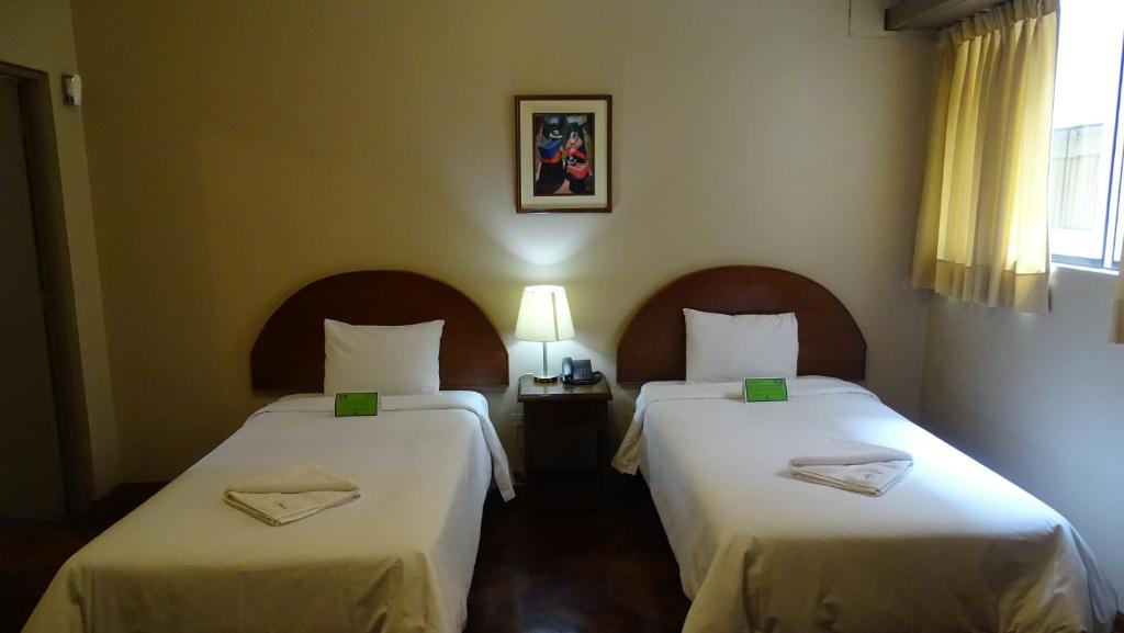 Postel nebo postele na pokoji v ubytování Suites Larco 656 Miraflores Lima