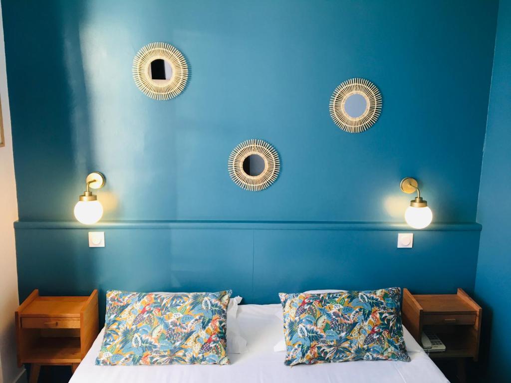 Postel nebo postele na pokoji v ubytování Hotel du Parc