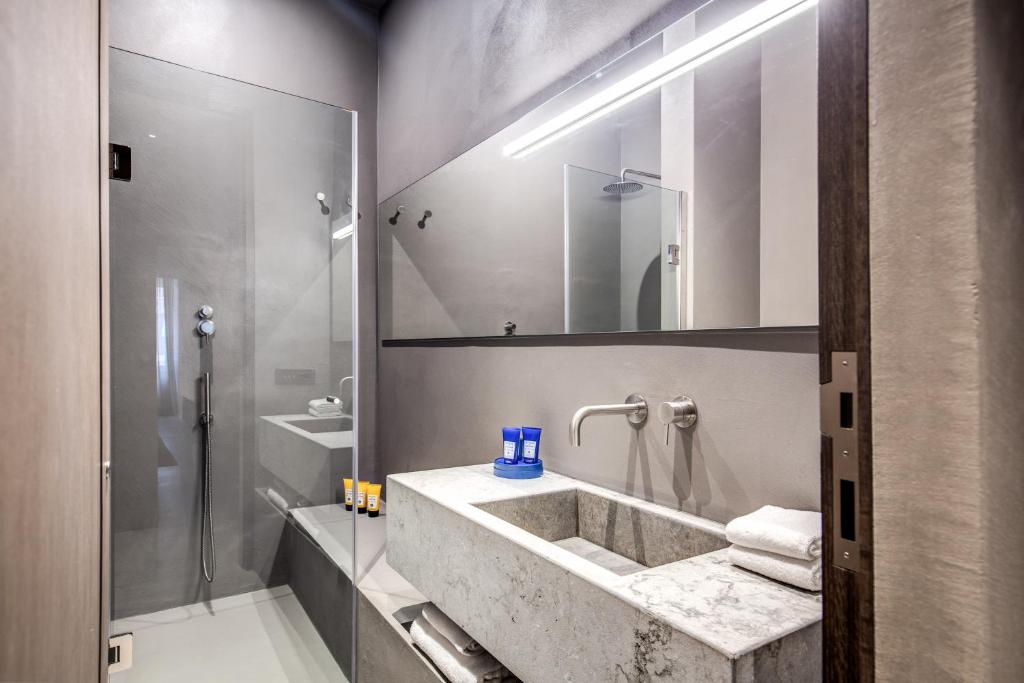 Kúpeľňa v ubytovaní Elysium Suites collection