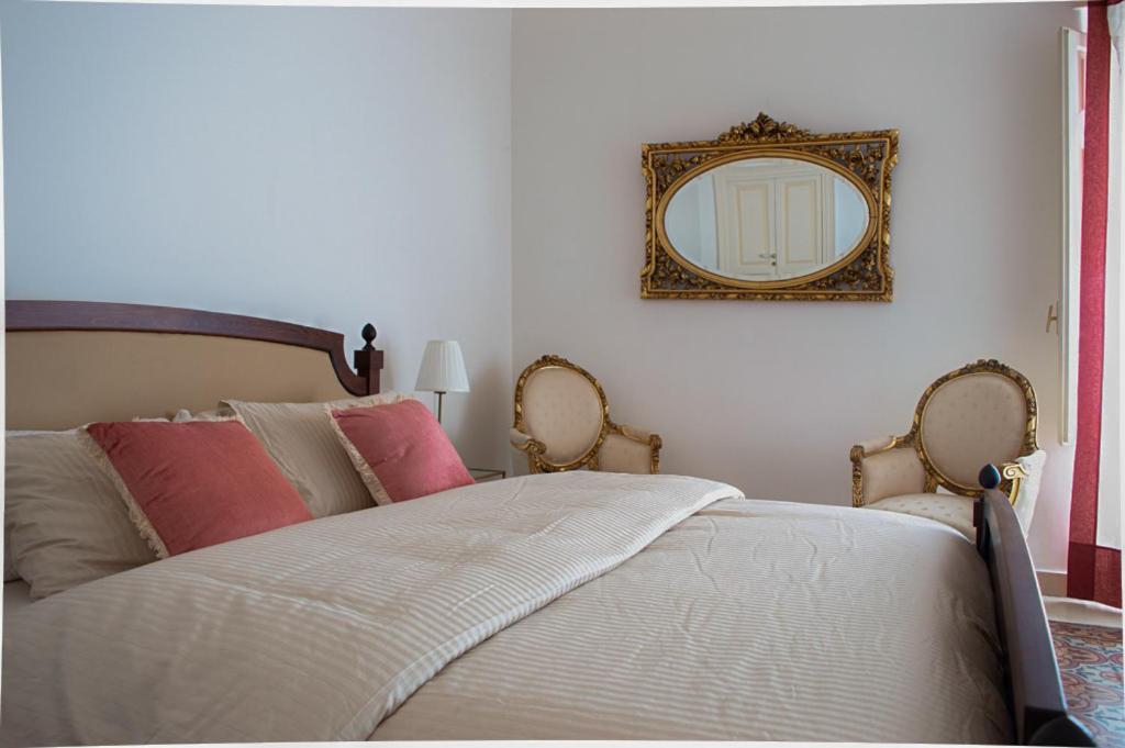 Posteľ alebo postele v izbe v ubytovaní Santa Domenica Guest House