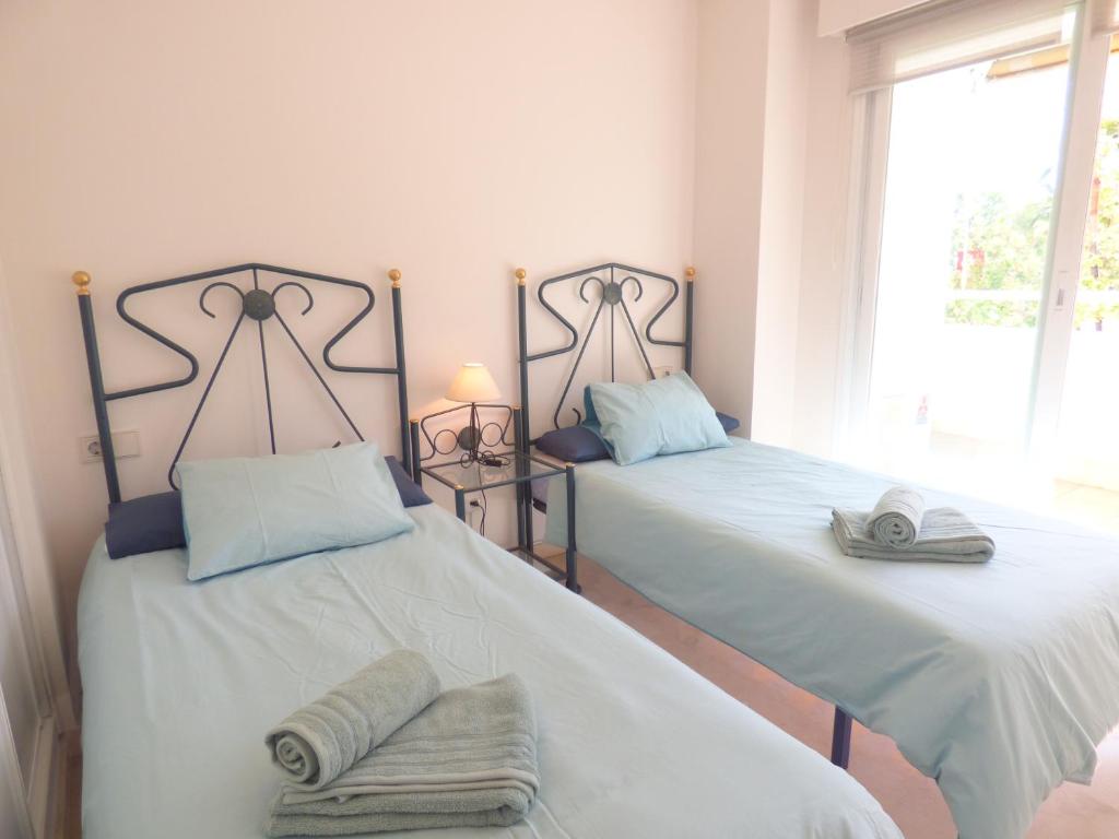 Posteľ alebo postele v izbe v ubytovaní Puerto Azul - EaW Homes