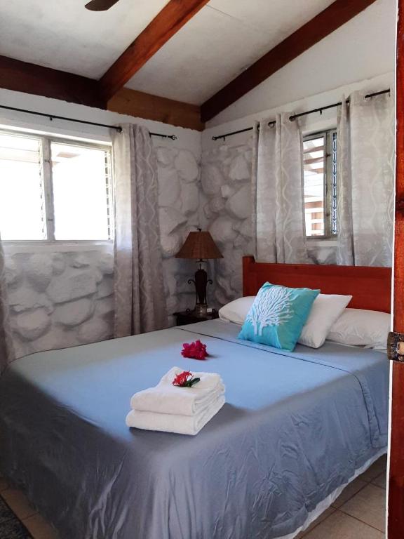 Postel nebo postele na pokoji v ubytování Dolphin Bay Hideaway