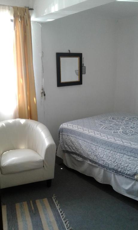 Postel nebo postele na pokoji v ubytování Habitaciones Florencia