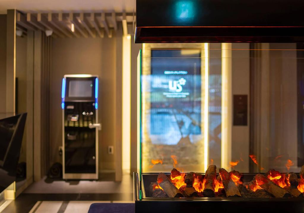 TV a/nebo společenská místnost v ubytování HOTEL U's 香櫨園
