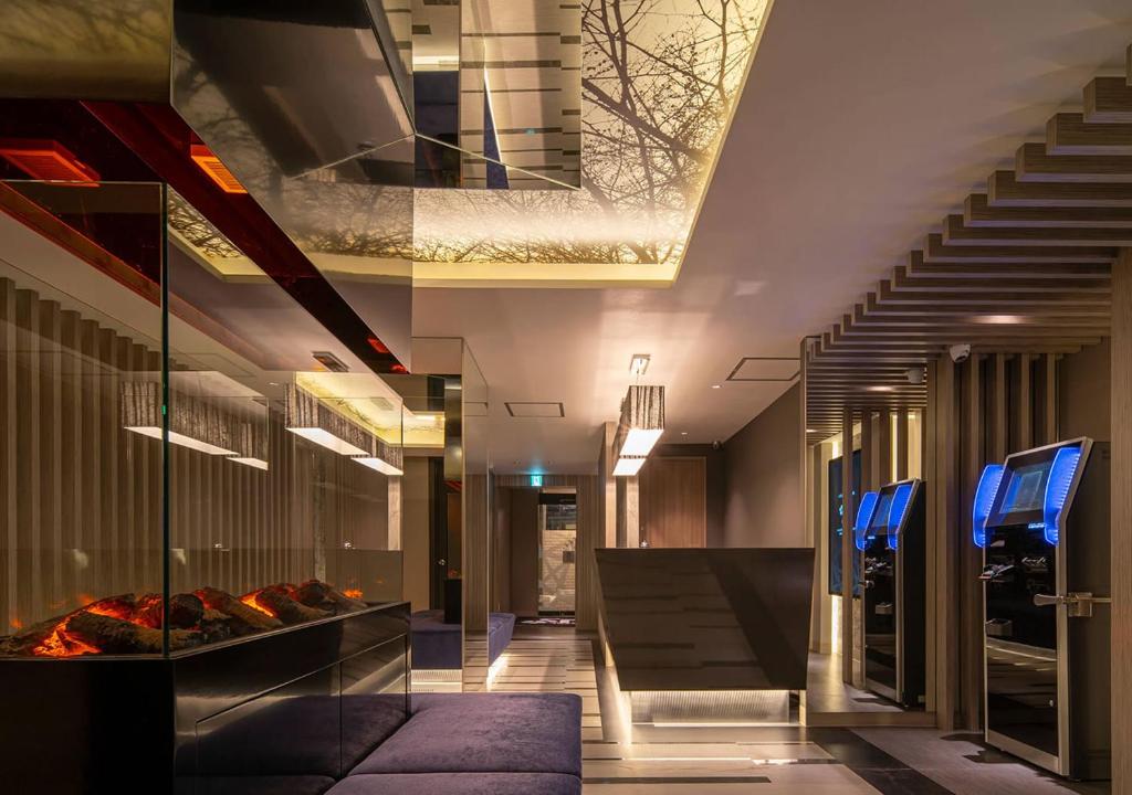 TV a/nebo společenská místnost v ubytování HOTEL U's 香櫨園