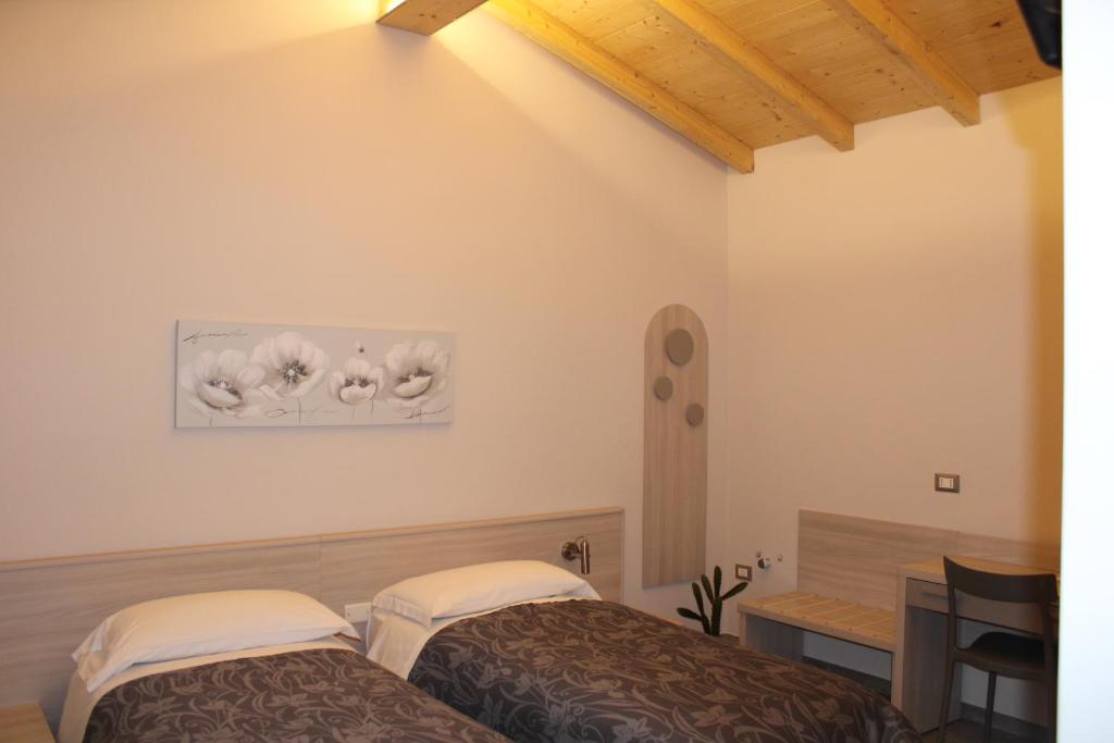 Posteľ alebo postele v izbe v ubytovaní Agriturismo Ravaglia Grande