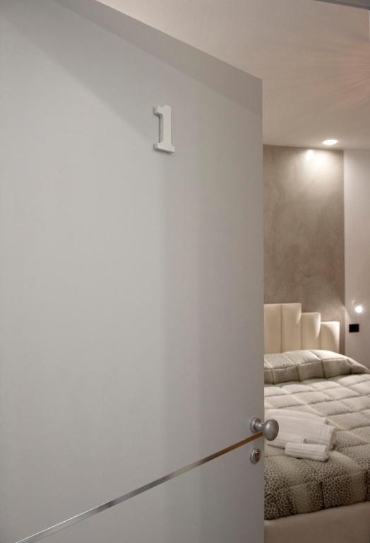Postel nebo postele na pokoji v ubytování SABRILUNA ROOMS